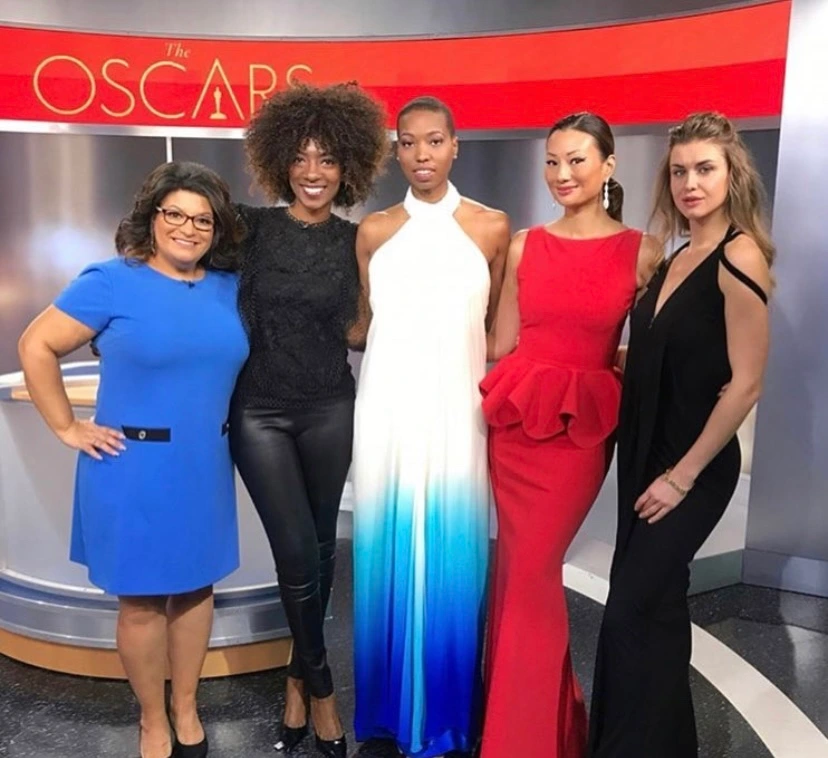 Five women posing at Oscars event
