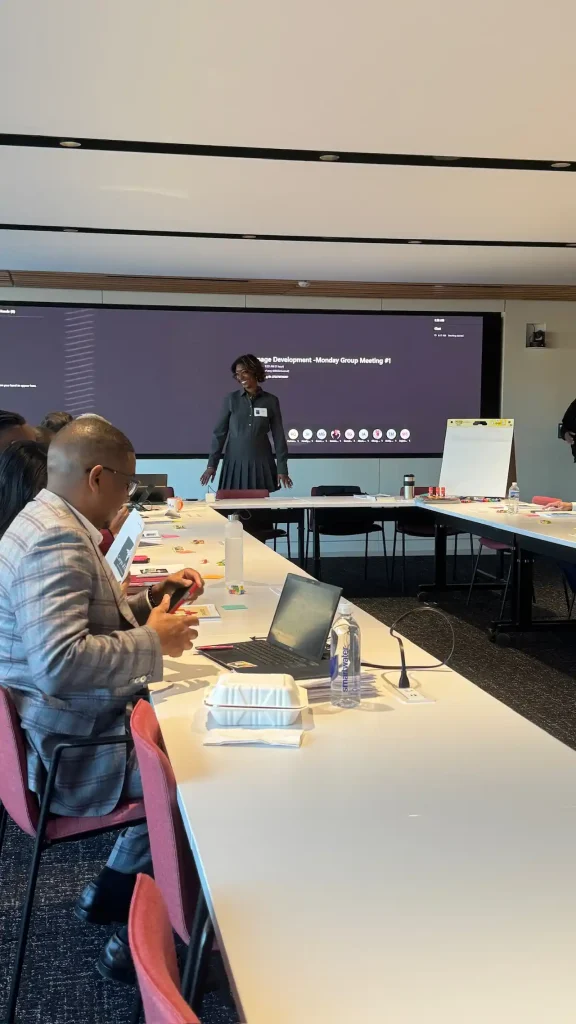 Team meeting with a presentation screen